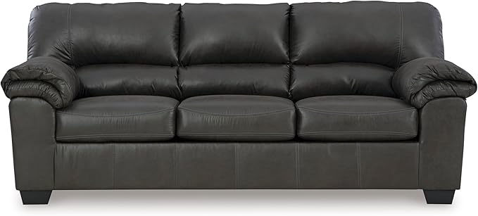 An empty living room scene with the Bladen sofa as the central piece of furniture.