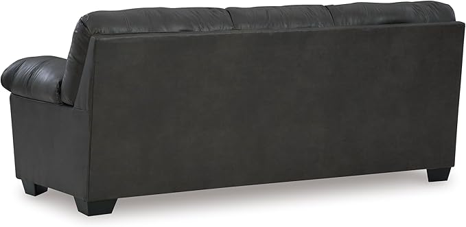 Side profile of the sofa, highlighting the gentle curve of the armrests and overall depth.