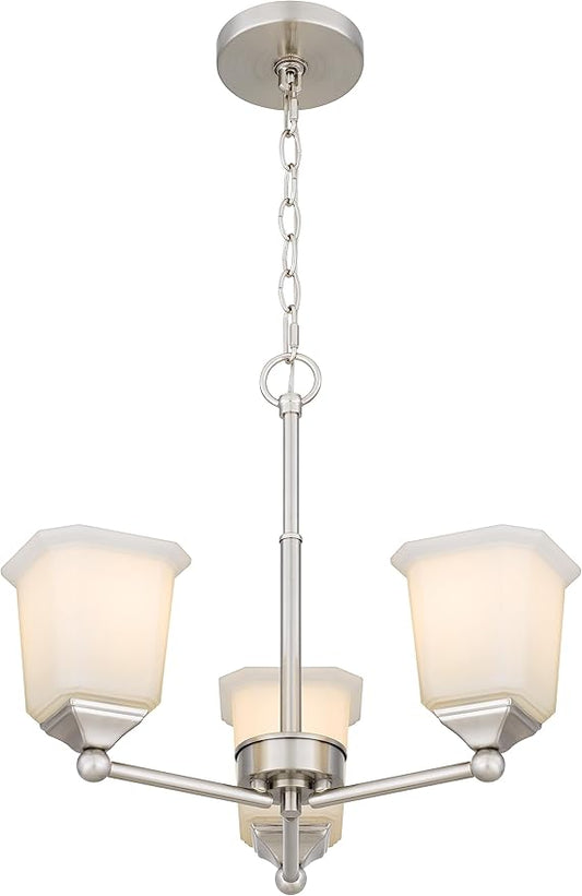 Close-up of one white glass shade and the brushed nickel arm of the pendant light fixture.