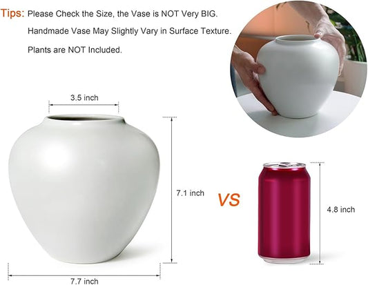 Close-up of the vase's smooth, glossy white surface, highlighting its handmade pottery texture.