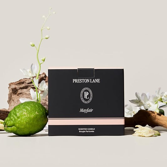 Close-up of the three wicks and smooth vegan soy wax blend surface inside the ceramic jar.