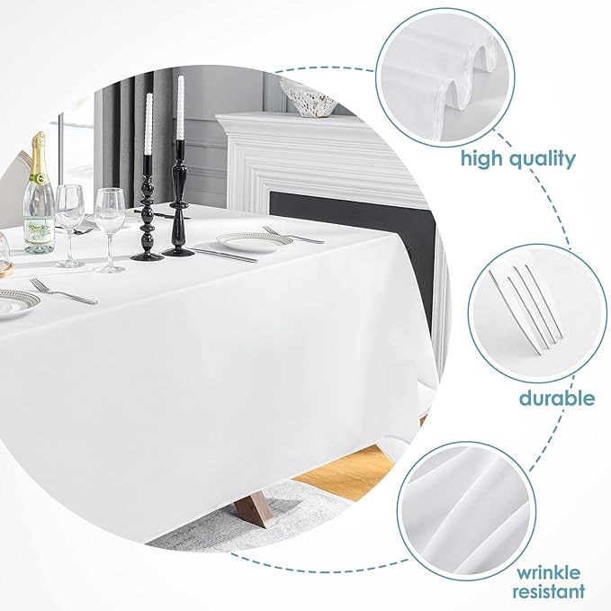The white tablecloth folded compactly, suitable for storage or transport.