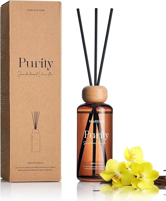 Complete Sandalwood Vanilla reed diffuser set with a glass bottle and natural diffuser sticks.
