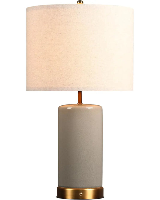 Stone grey cordless ceramic table lamp with a soft glow, perfect for a bedside or living room.