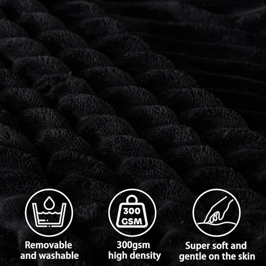 Angled shot of the large black reading pillow, showcasing its supportive triangular shape.