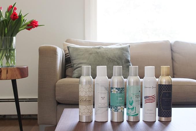 The White Zen scent room spray bottle placed on a bathroom counter for easy access.