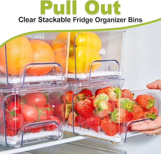 One organizer bin pulled out from a refrigerator shelf, filled with fresh fruit.