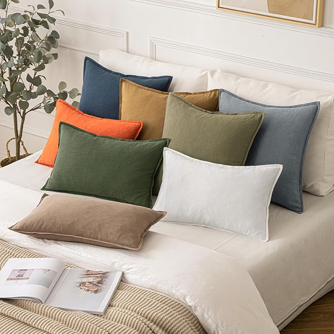 Detail shot of the well-constructed edges and hidden zipper on the navy blue pillow cover.