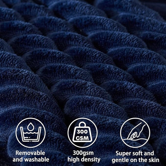 Angled shot of the large blue reading pillow, showcasing its supportive triangular shape.