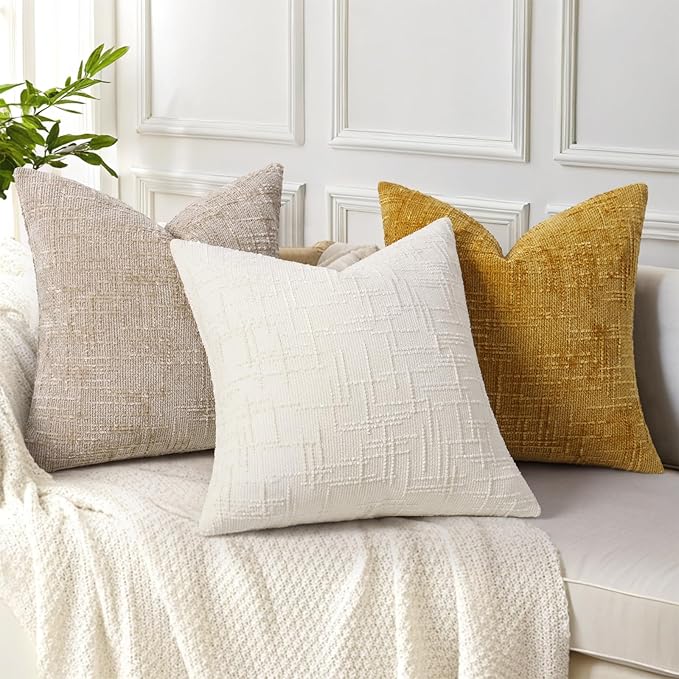 Two mustard yellow chenille throw pillow covers, 16x16 inches, stacked to emphasize their plush texture and color.