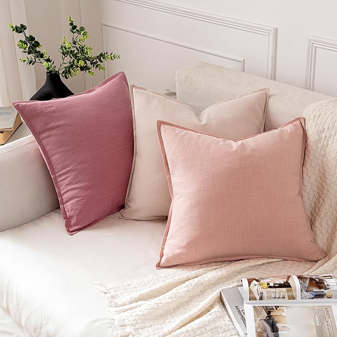 Side view of a light pink pillow cover, showing the quality construction and discreet zipper.