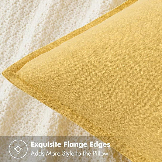Close-up view of the yellow linen fabric, highlighting its subtle woven texture.