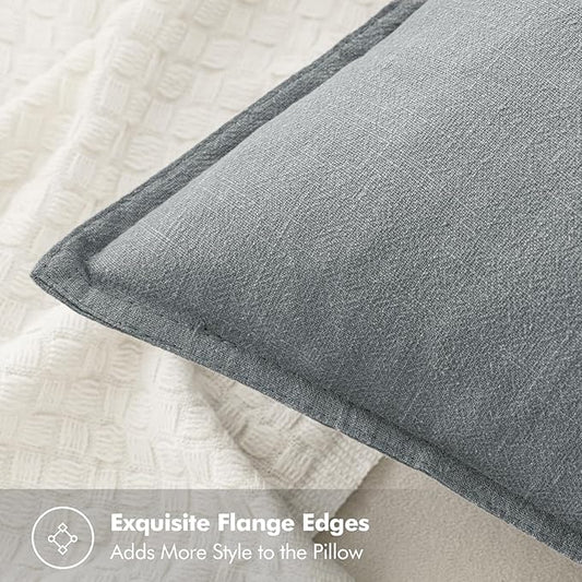 Close-up detail of the soft, woven texture of the gray linen fabric, highlighting its natural look.