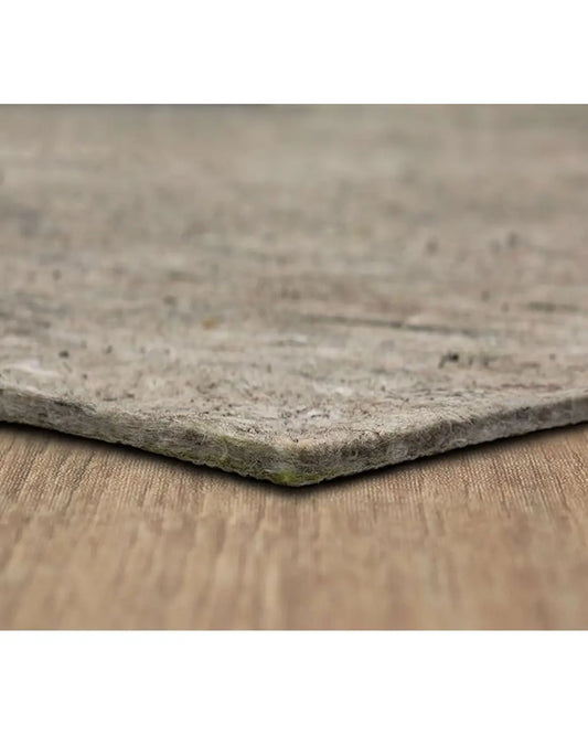 Rectangular rug pad, 7-foot x 10-foot, laid flat on a light-colored floor.