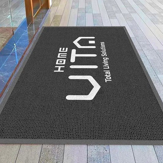 A custom commercial doormat featuring a personalized business logo, ideal for high-traffic entryways.