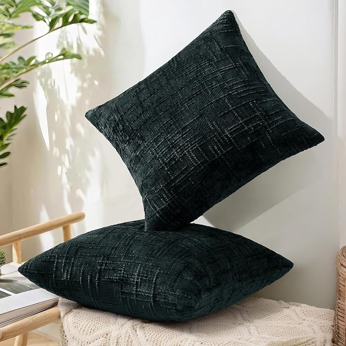 A single black 22x22 inch chenille pillow cover laid flat, showcasing its full textured surface.