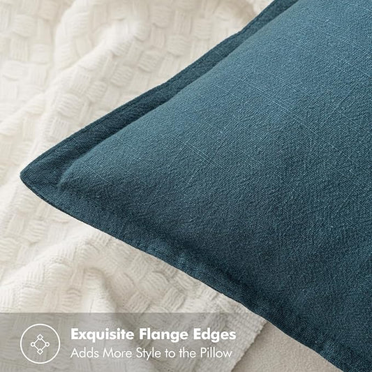 Close-up of the blue linen fabric, showing its subtle texture and natural variations.