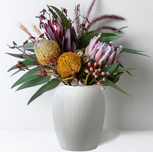 Side profile of the 25cm white vase, showcasing its unique Rhodes pattern and elegant silhouette.