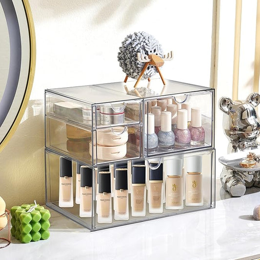 The 8-drawer acrylic organizer displayed on an office desk, filled with various supplies.