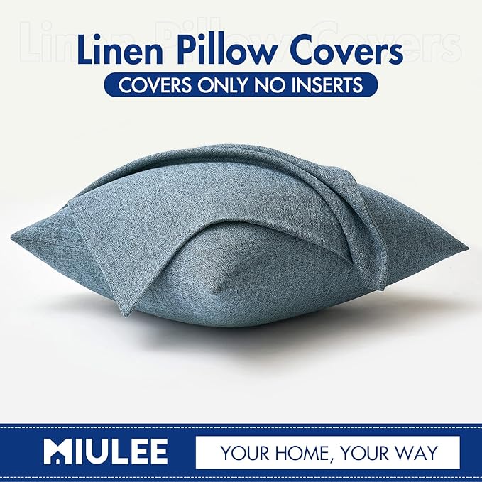 Two dusty blue decorative pillow covers stacked, illustrating their uniform size and consistent color.