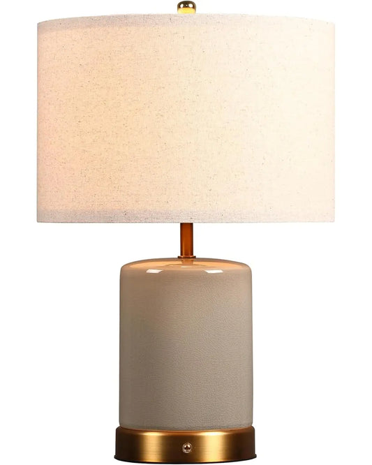 Stone grey cordless ceramic table lamp with a soft glow, perfect for a bedside or living room.