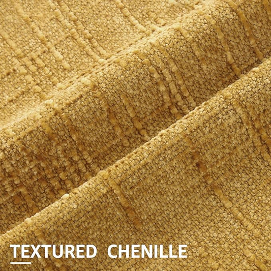 Close-up detail of the mustard yellow chenille fabric, showing its unique thick, textured, and slubby weave.