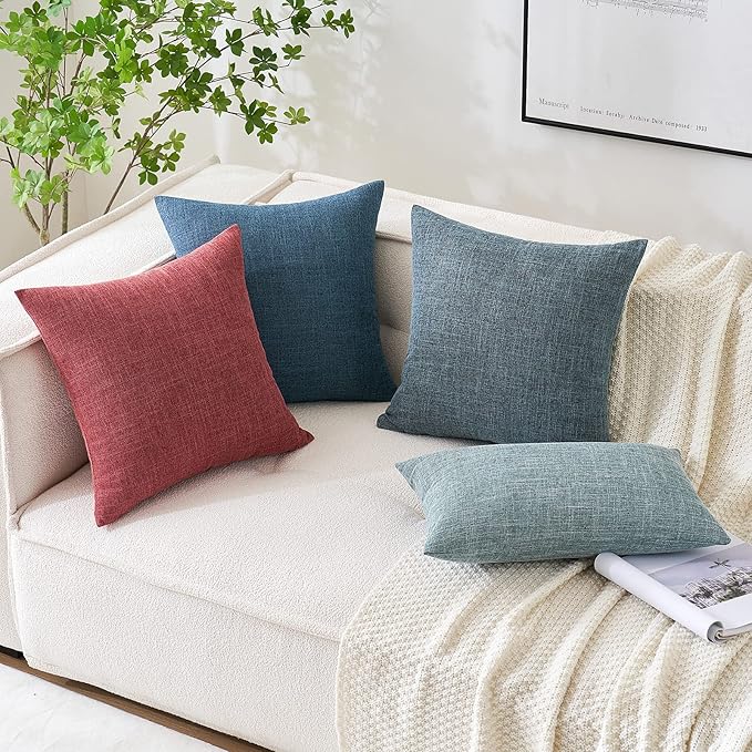 Corner detail of the dusty blue burlap pillow cover, emphasizing the durable seams and fabric.