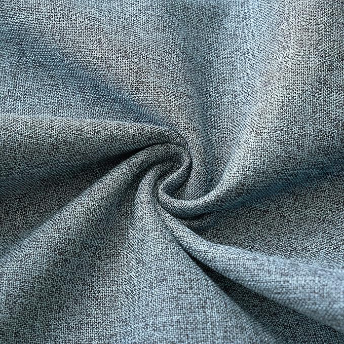 Detailed shot of the invisible zipper closure on the back of a dusty blue linen burlap pillow cover.